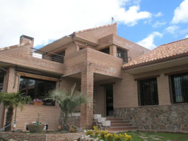 Villa En venta en Colmenar del Arroyo photo 0