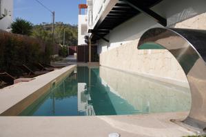 Exclusiva promoción de obra nueva a 50 metros del mar en Caló des Moro. photo 0