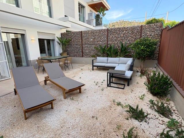 Exclusiva promoción de obra nueva a 50 metros del mar en Caló des Moro photo 0