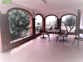 PARCELA CON DOS CASAS Y PISCINA. photo 0