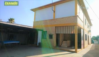 SE VENDE PARCELA CON AMPLIA CASA photo 0