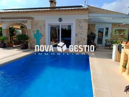 Chalet alto standing en venta en Cala Mendia photo 0