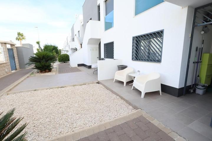 BUNGALOW PLANTA BAJA EN LA ZENIA OASIS BEACH. 2 DORM. 2 BAÑOS. PARKING+PISCINA. SUPERFICIE 70 M2. photo 0
