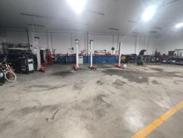 NAVE INDUSTRIAL PARA TALLER DE MECÁNICA Y LAVADERO DE VEHICULOS CON TRASPASO. photo 0