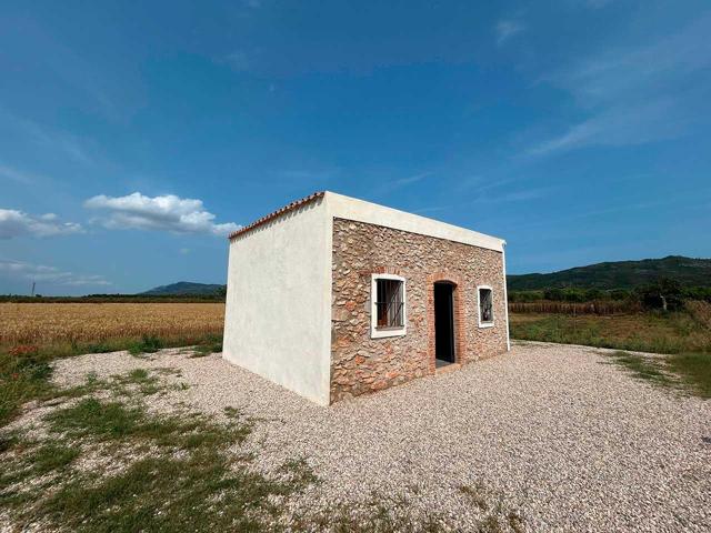 Oportunidad única de caseta de campo con finca de regadío de 11.684m². photo 0