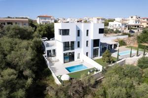 Tu rincón soñado en la costa: moderna villa adosada con piscina privada en Portocolom photo 0