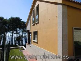 Chalet unifamiliar en venta en Oia (Santa María) photo 0