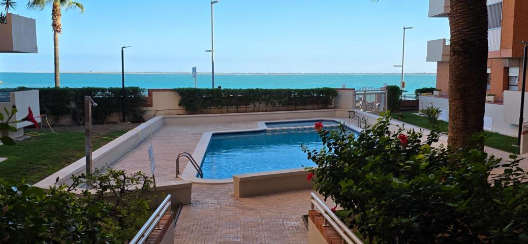 Apartamento junto al mar con piscina comunitaria, ascensor y licencia turística en L’Ampolla photo 0