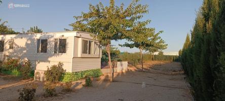 API LUNA INMOBILIARIA VENDE TERRENO CON ROULOTTE photo 0
