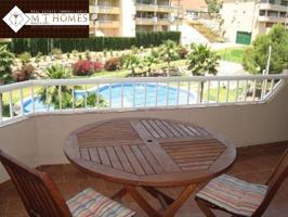 BONITO ÁTICO EN TORREBLANCA DEL SOL CON PISCINA Y GARAJE photo 0