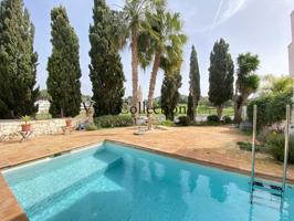 Alquiler de temporada - Hermosa casa adosada con piscina y vistas al golf en Roca Llisa, Ibiza photo 0