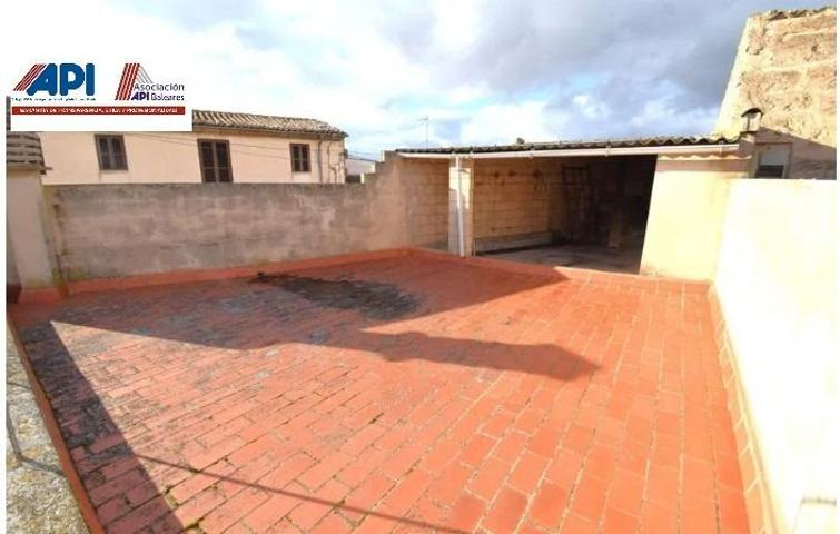 Casa de pueblo con patio y garaje en Muro photo 0