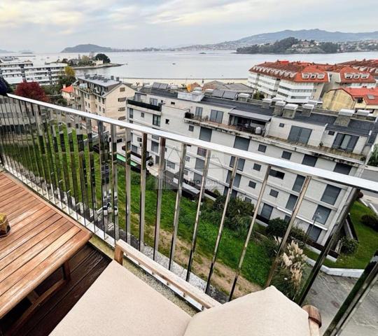 ATICO EN BAIONA. DOS TERRAZAS, DOS HABITACIONES Y DOS PLAZAS DE GARAJE Y VISTAS A LA BAHÍA. photo 0