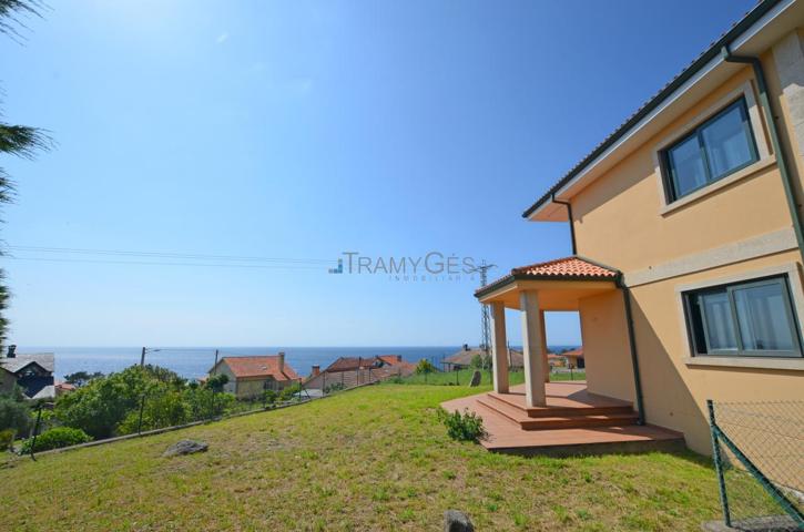 CHALET A ESTRENAR CON VISTAS AL MAR Y A LA MONTAÑA EN OIA photo 0
