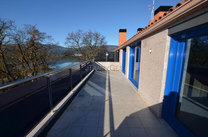 ÁTICO CON DOS AMPLIAS TERRZAS Y VISTAS A LA RÍA CON GARAJE Y TRASTERO A ESTRENAR photo 0