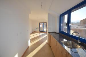PISO DE 2 HABITACIONES CON GARAJE Y TRASTERO A ESTRENAR EN ARCADE, PRIMERA LÍNEA photo 0
