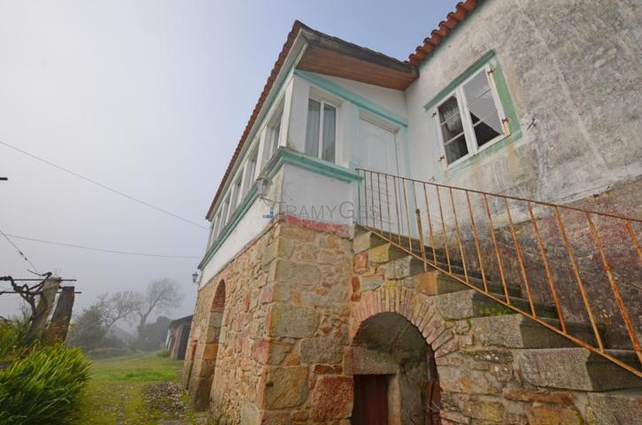 CASA DE PIEDRA ESTILO RUSTICO PARA REFORMAR SOBRE AMPLIA PARCELA CERCA DEL CENTRO EN O ROSAL photo 0