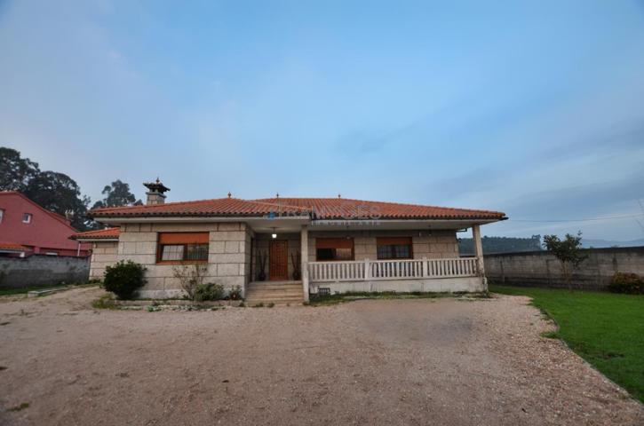 Chalet de piedra en planta baja con piscina en Carregal - Tomiño photo 0