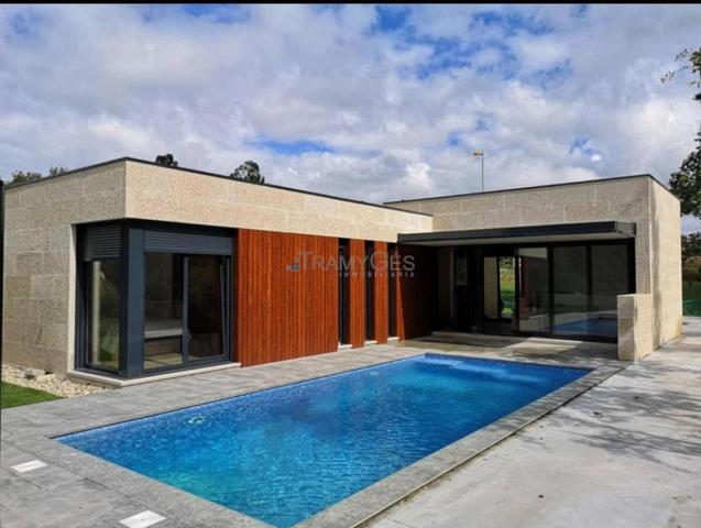 PRECIOSA CASA DE PLANTA BAJA CON PISCINA PRÓXIMA AL CENTRO DE TOMIÑO photo 0