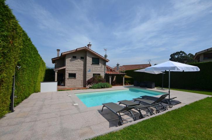 Chalet de piedra con piscina en zona tranquila de Tui con vistas hacia Portugal photo 0