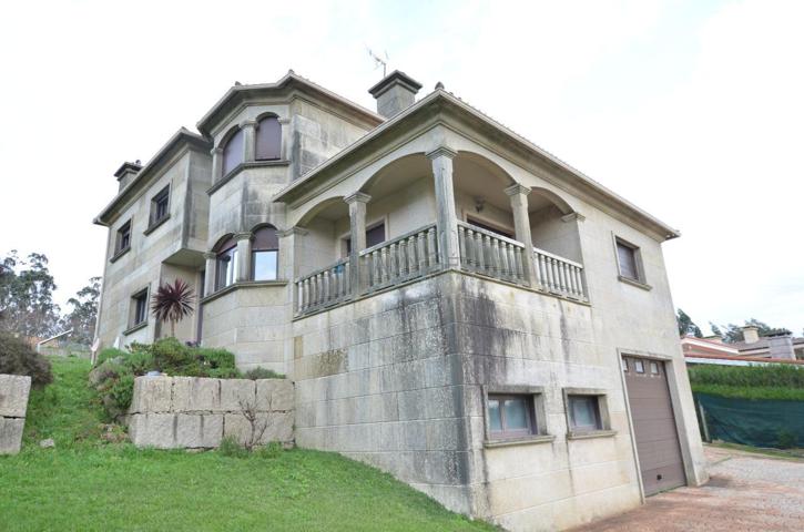 AMPLIO CHALET DE PIEDRA EN MOS photo 0