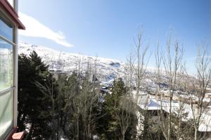 **Dúplex en Sierra Nevada: Tu Refugio Ideal en el Edificio Europa** photo 0