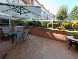 PLANTA BAJA EN DOS ALTURAS CON TERRAZA Y GARAJE EN SANTIAGO DE CARTES.- photo 0