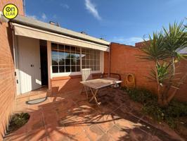 ACOGEDORA CASA ADOSADA EN VENTA EN L'AMETLLA DEL VALLÈS photo 0