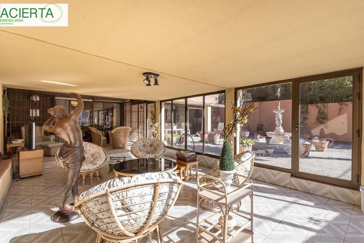 EXCLUSIVO PISO CON JARDÍN PRIVATIVO EN UNA DE LAS MEJORES URBANIZACIONES DE GRANADA photo 0
