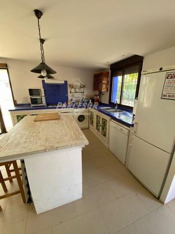 ZONA LA BARQUERA - Parcela de 1000 m2. con casa compuesta por 3 dormitorios. photo 0