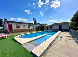 ZONA HIGUERON - ADAPTADA para minusválidos- Parcela de 1.500m con casa de 3 hab.+piscina+trasteros photo 0