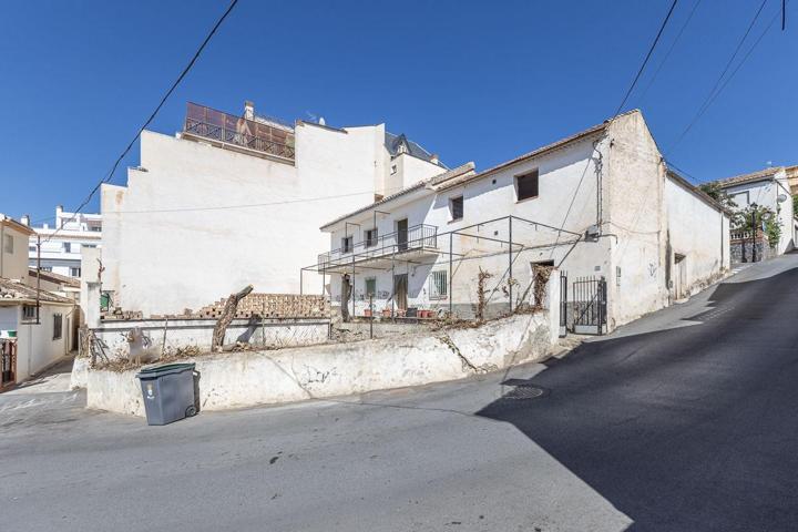 VIVIENDA EN CALLE PRINCIPAL DEL BARRIO DE MONACHIL CON MÚLTIPLES POSIBILIDADES (500 M2 SUPERFICIE TOTAL) photo 0