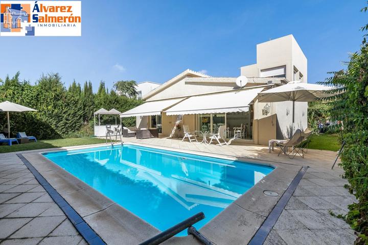 CHALET CON PARCELA Y PISCINA EN URBANIZACIÓN LOS CHOPOS. photo 0