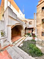 CALONGE: CASA DE PIEDRA PARA RESTAURAR CON GARAJE Y PATIO EN PLENO CENTRO DEL PUEBLO photo 0