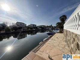 EXCLUSIVA CASA EN EMPURIABRAVA: LUJO MEDITERRÁNEO CON ACCESO DIRECTO AL CANAL photo 0