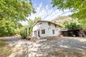 Gran finca con vivienda en Cogollos De La Vega photo 0