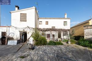 CASA CORTIJO CON PARCELA RÚSTICA DE RIEGO photo 0