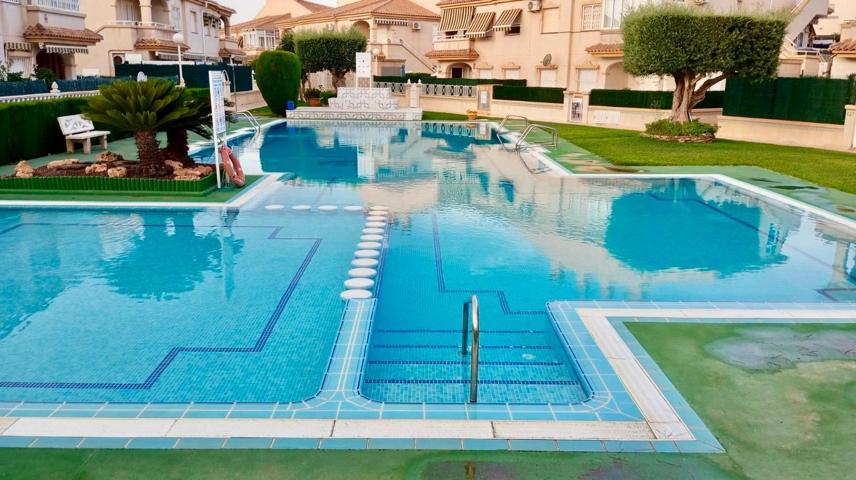 FANTÁSTICO ADOSADO EN RESIDENCIAL CON PISCINA Y JARDINES EN TORREBLANCA photo 0