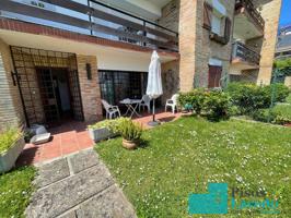 Bajo con jardin en alquiler photo 0
