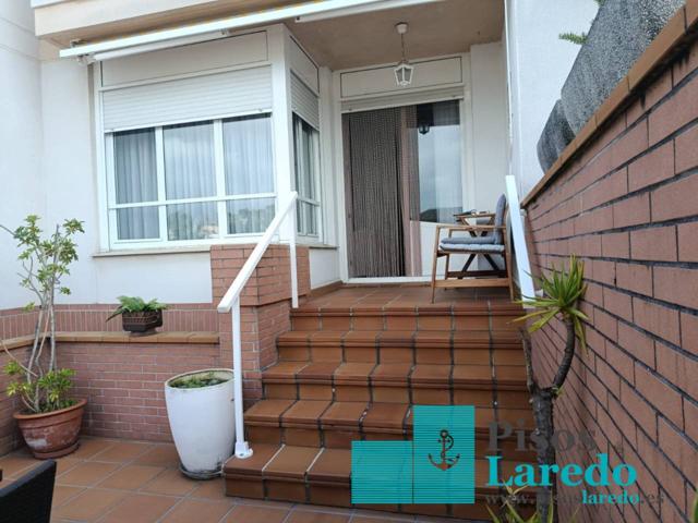Venta de chalet adosado en Laredo photo 0