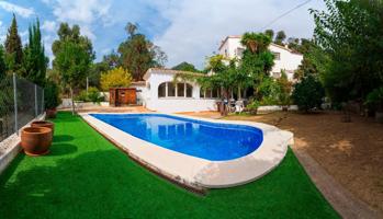 Casa independiente con encanto, jardín con piscina y vistas al mar. Dos viviendas en una. photo 0