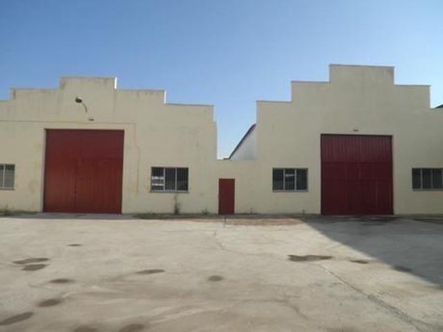 OPORTUNIDAD DE 2 NAVES INDUSTRIALES EN TROBAJO DEL CAMINO photo 0