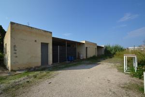 Almacén-trastero con plaza de parking en venta en la urbanización Riumar photo 0