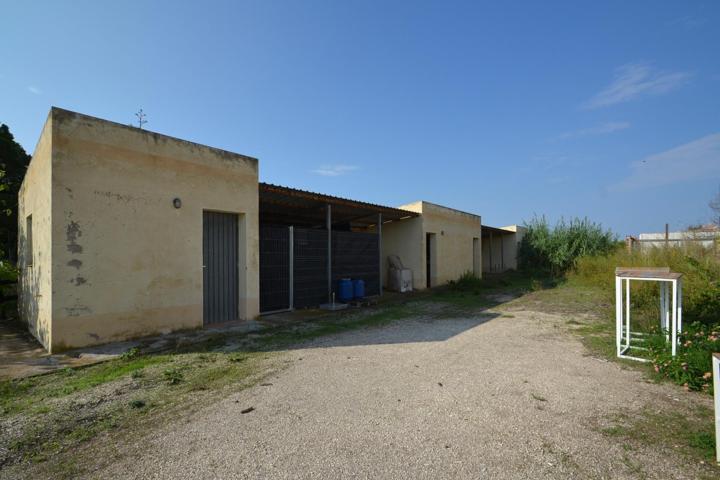 Almacén-trastero con plaza de parking en venta en la urbanización Riumar photo 0
