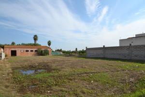 Solar en venta de 890 m² con proyecto de vivienda en el centro de Deltebre photo 0