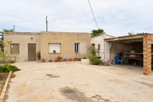 Casa con almacén y amplio terreno en Deltebre para reformar photo 0