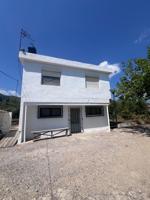 CASA CON TERRENO photo 0
