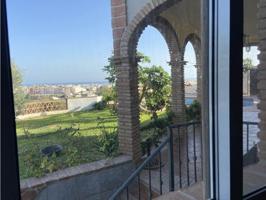 VENTA DE CASA ANDALUZA CON TERRENO EN NERJA photo 0