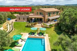 Exclusiva villa de lujo con piscina climatizada, amplios jardines y licencia turística en S’Horta. photo 0