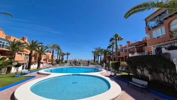 Bonito bungalow en planta baja de dos dormitorios con piscina comunitaria cerca de la Mata photo 0